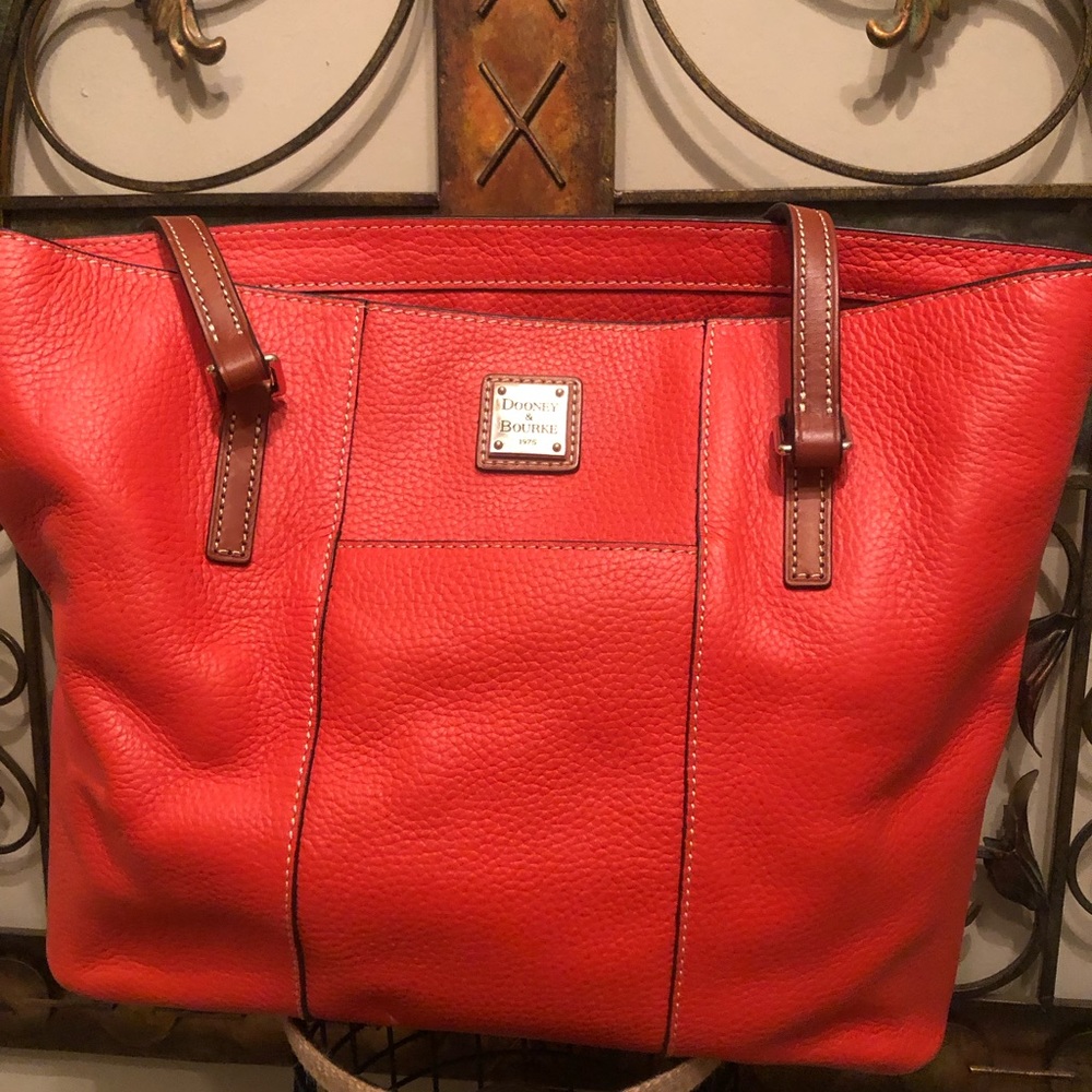 Hand bag; Dooney & Burke; orange tote; w/dust cover.